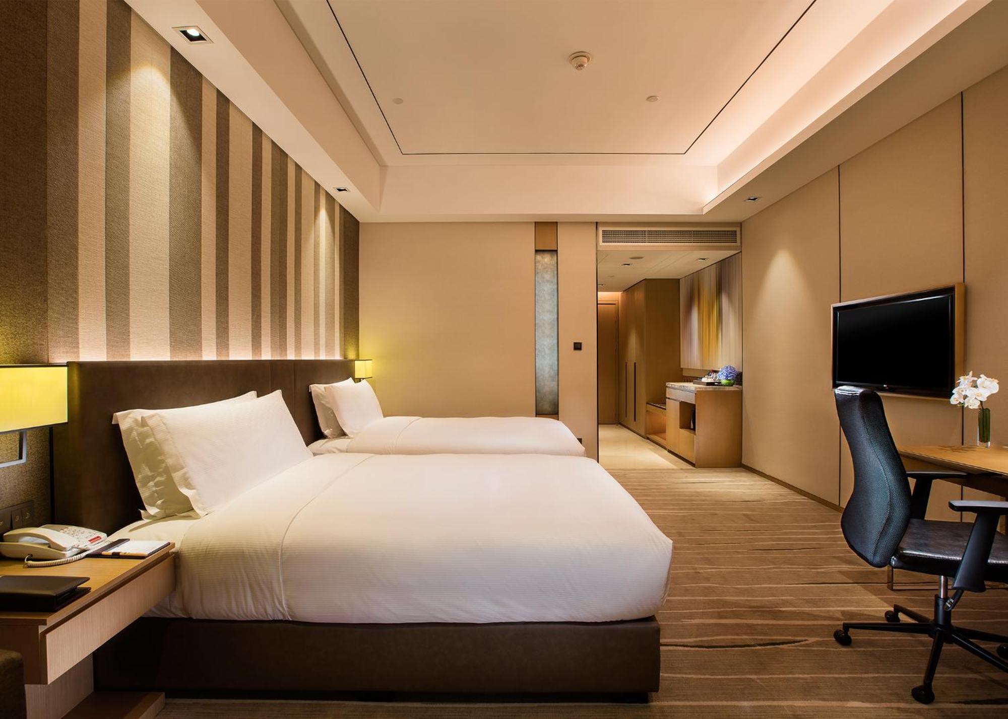Отель Doubletree By Hilton Chongqing - Nan'An Экстерьер фото